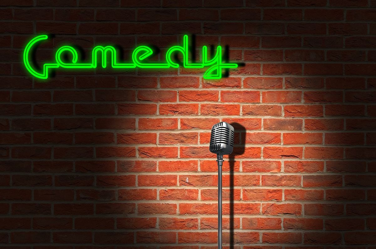 a standup comedy stage with a mic